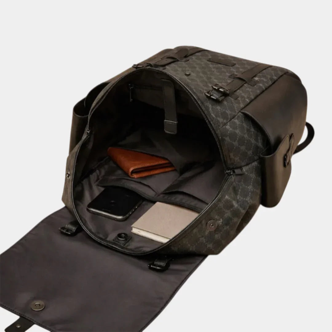 Leather backpack open at top, showing interior pockets and organizer compartments