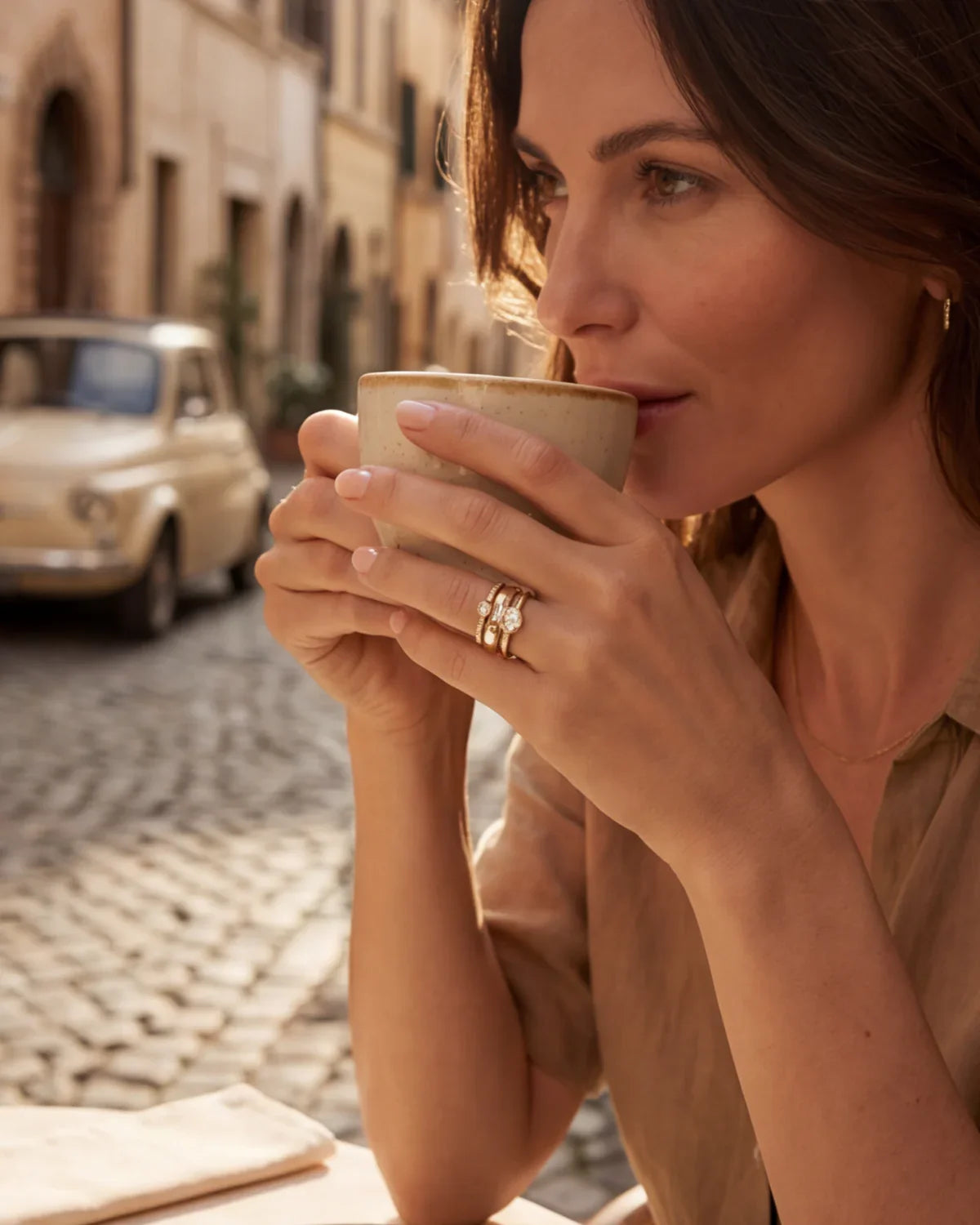 Gold ring set on a woman's hand