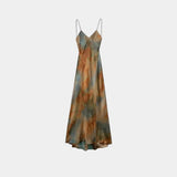 Abstract printed maxi dress with V-neck spaghetti straps, teal and rust tones, front view