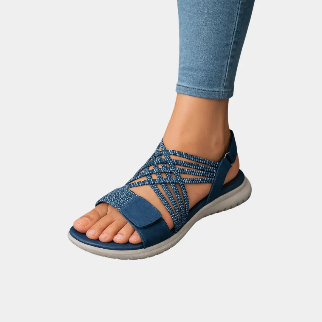 Blue knit orthopedic sandals with open toe and hook-and-loop strap