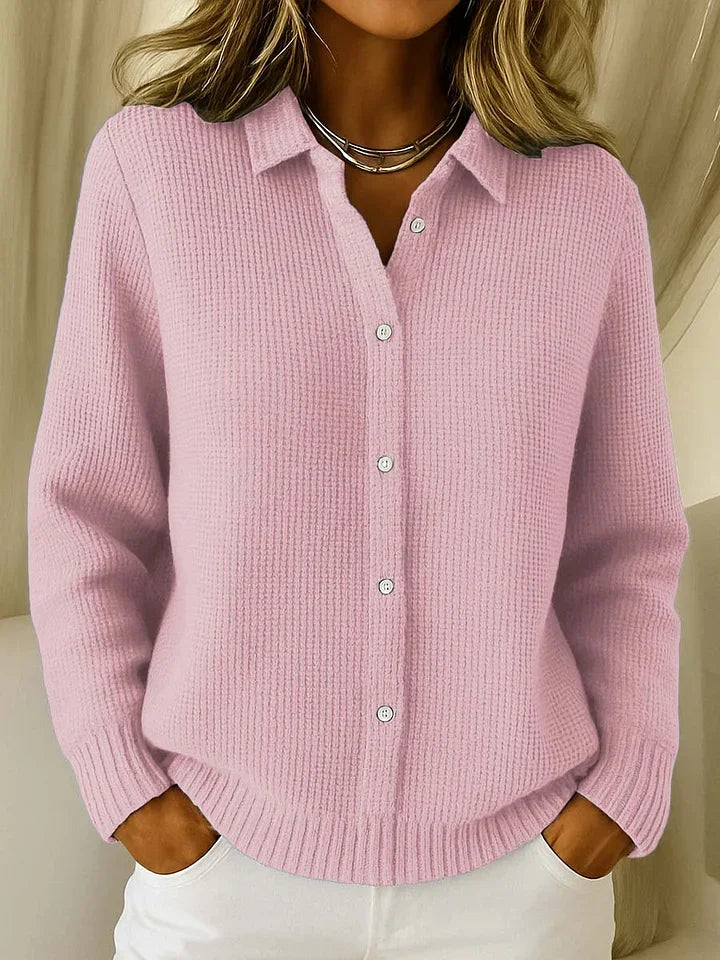 Pink button-front knit cardigan with collared neckline, long sleeves, ribbed hem