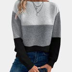 Crewneck knit pullover with long sleeves, light gray to dark gray stripe at hem