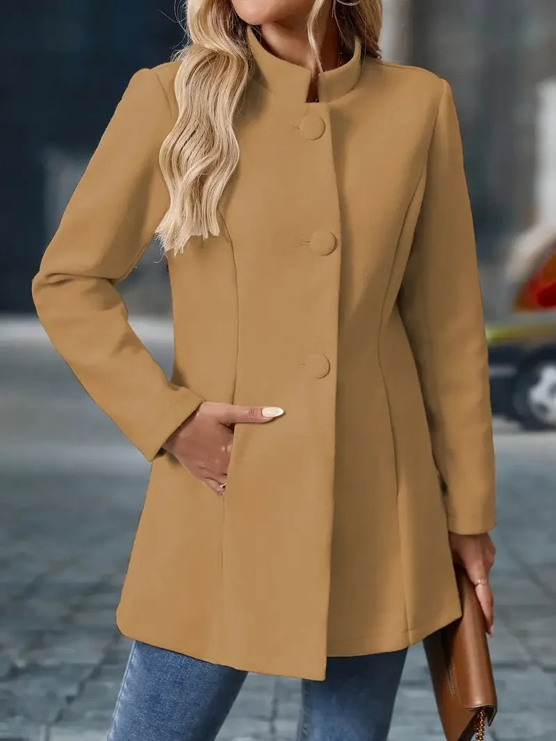 Camel button-front daily jacket with long sleeves and stand collar.