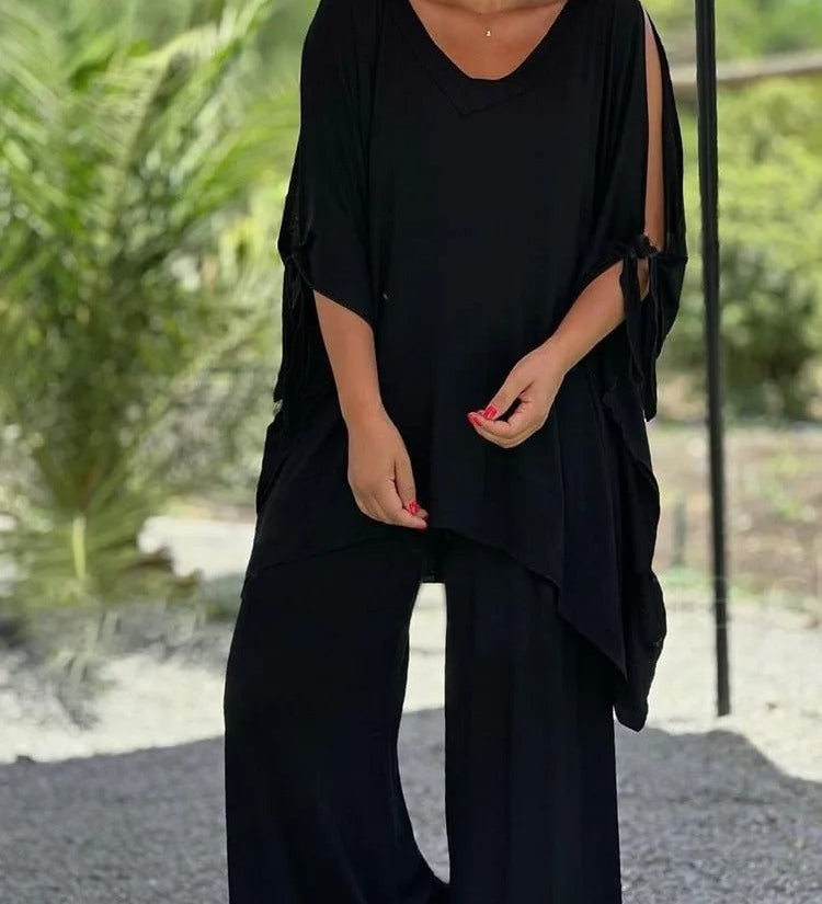 Black V-neck draped tunic with tie sleeves and wide-leg pants