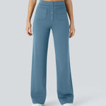Light blue wide-leg elastic pants with button-front detail and side pockets
