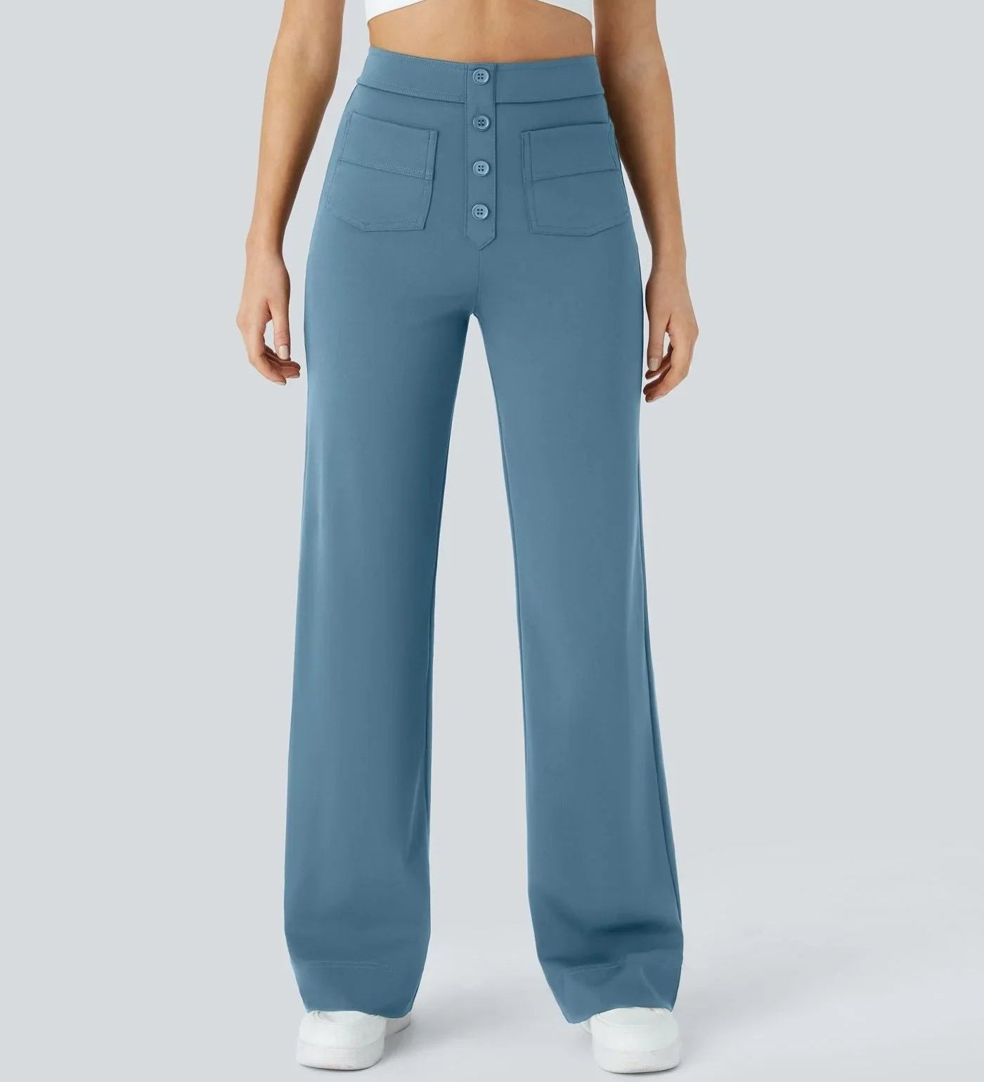 Light blue wide-leg elastic pants with button-front detail and side pockets