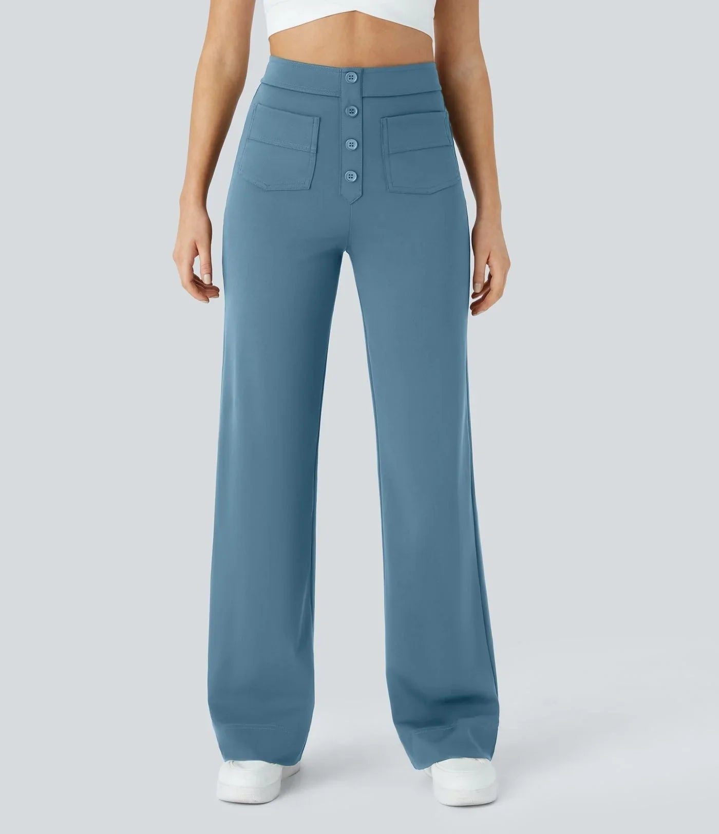 Light blue wide-leg elastic pants with button-front detail and side pockets