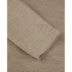 Beige merino wool cardigan sleeve cuff with ribbed hem edge
