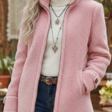 Pink soft mid-length textured coat with zip front and side pockets