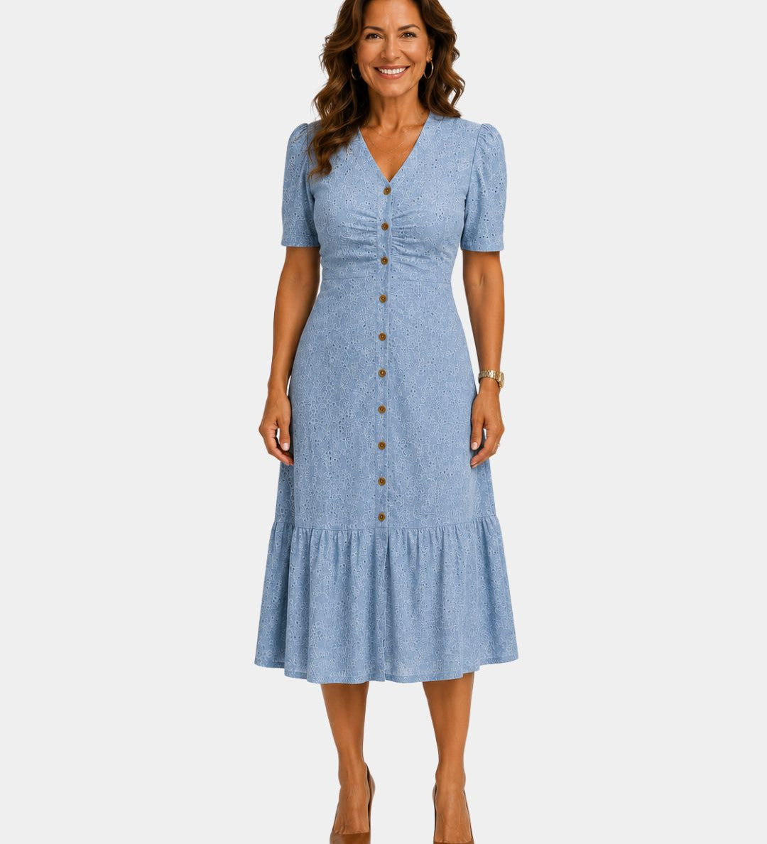 Lightweight shirt dress in light blue, short sleeves, button front, tiered skirt hem.