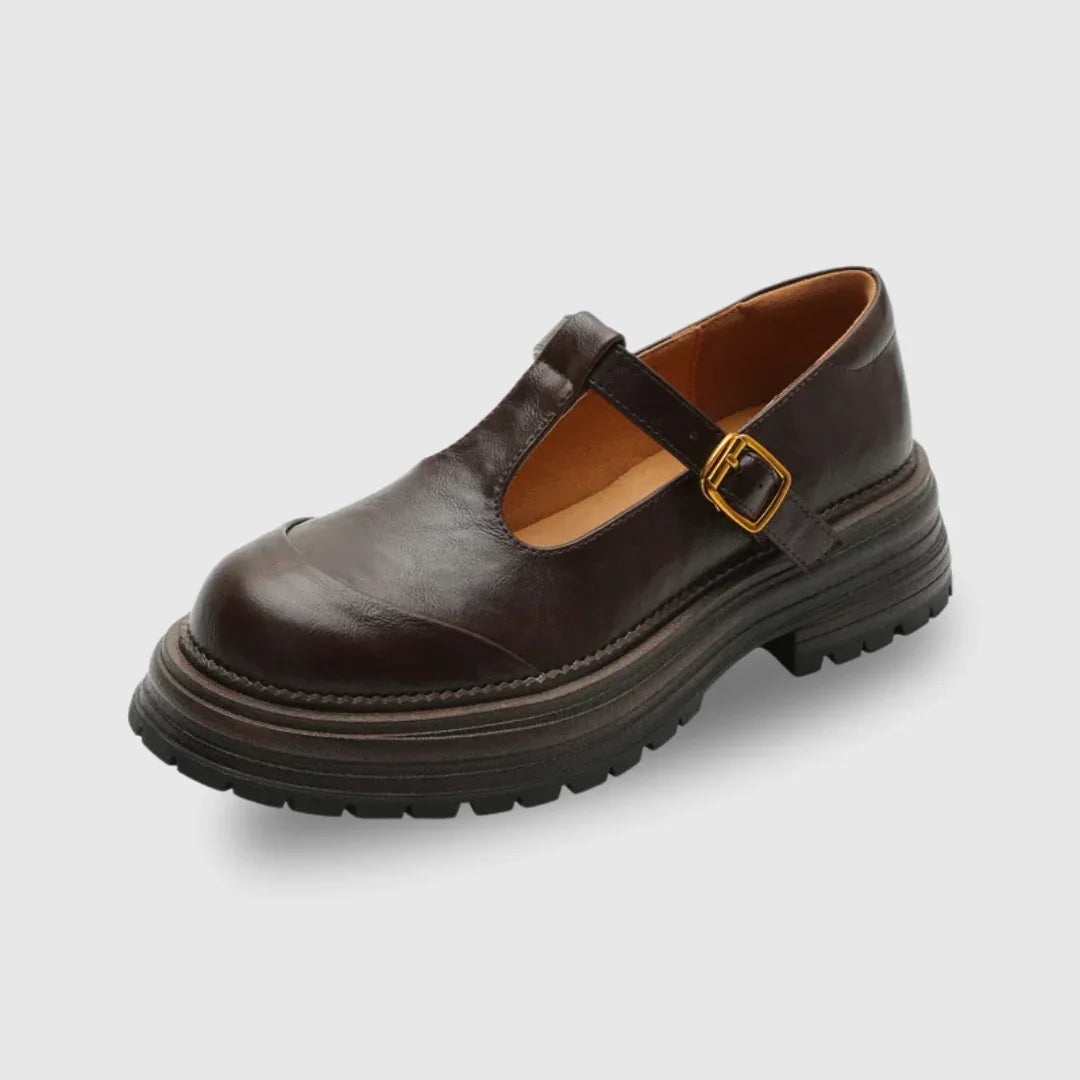 Dark brown T-bar leather shoes with gold buckle and chunky platform sole