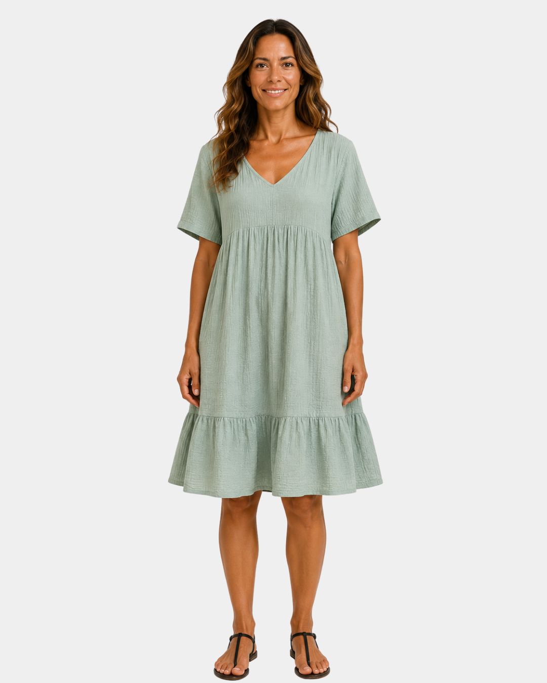 Light green textured V-neck midi dress with short sleeves and tiered skirt