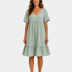 Light green textured V-neck midi dress with short sleeves and tiered skirt