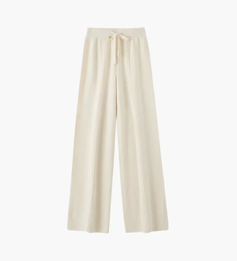 Pure merino wool trousers in ivory with elastic drawstring waist and straight wide fit