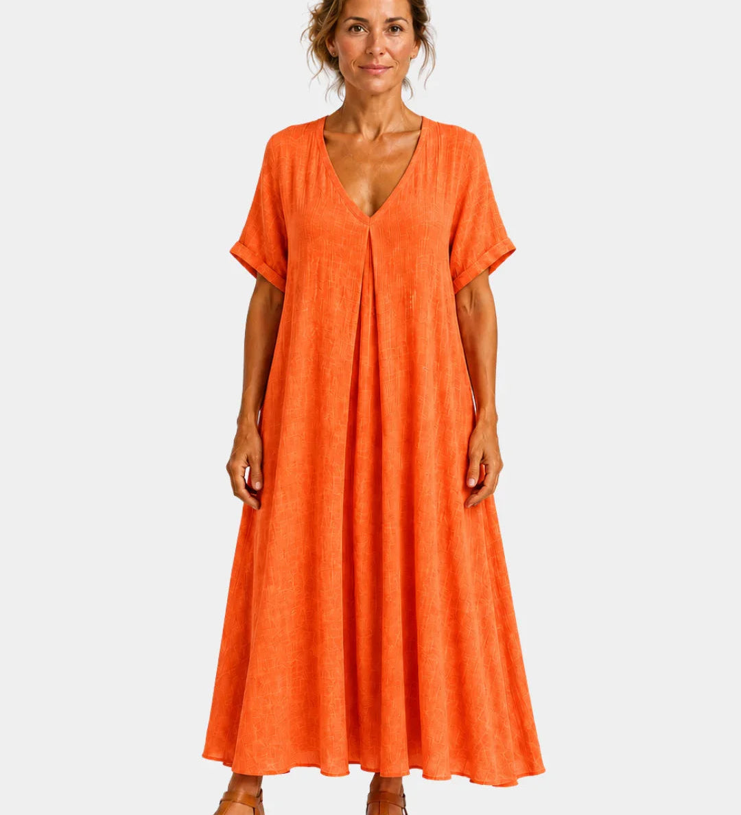 Orange lightweight long dress with V-neck, short sleeves and gathered skirt.
