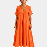 Orange lightweight long dress with V-neck, short sleeves and gathered skirt.