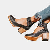Black snake-print ankle-strap block heel shoes with buckle, wooden-look heel, pointed toe