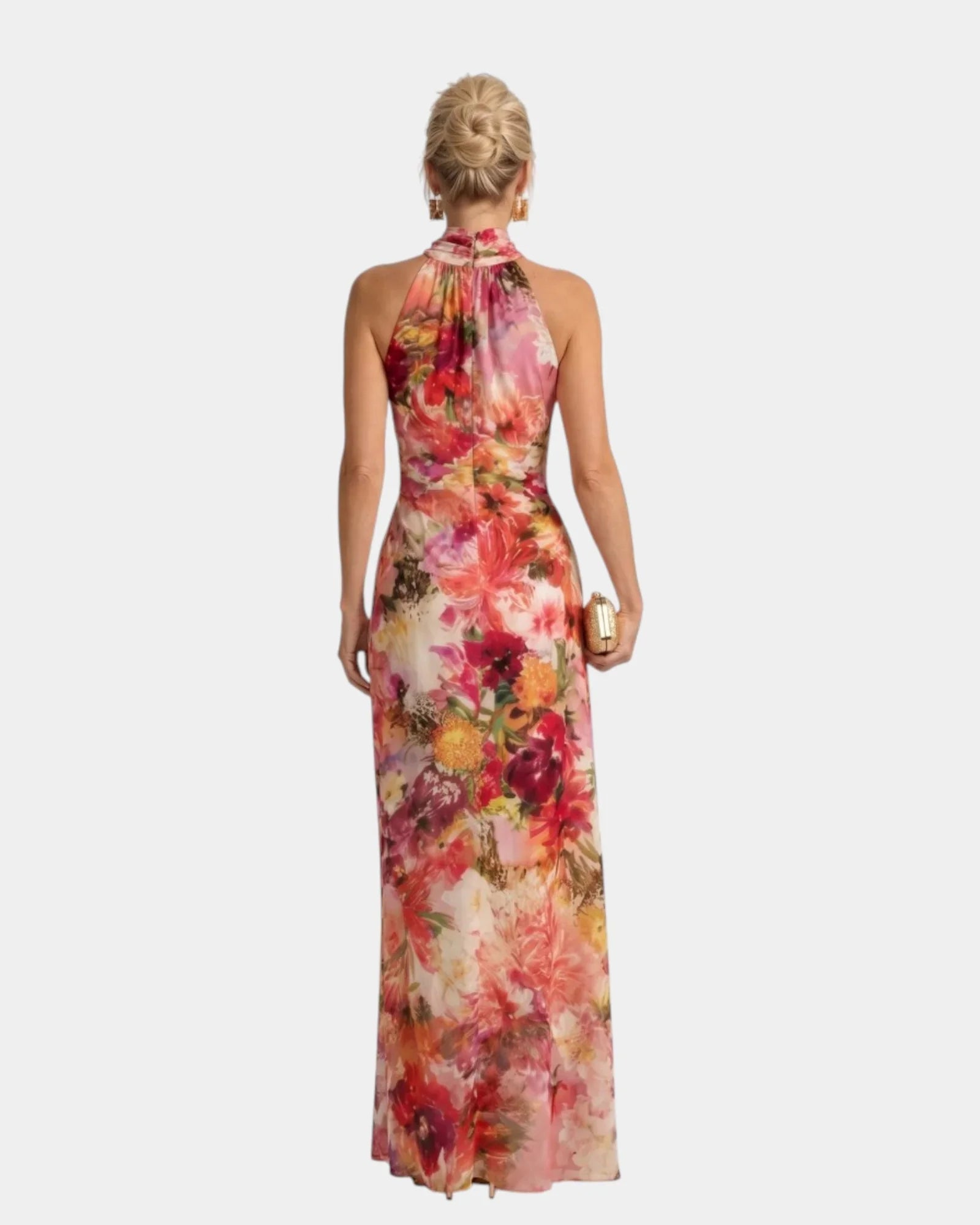 Back view of floral halter maxi dress with halter neck and long skirt
