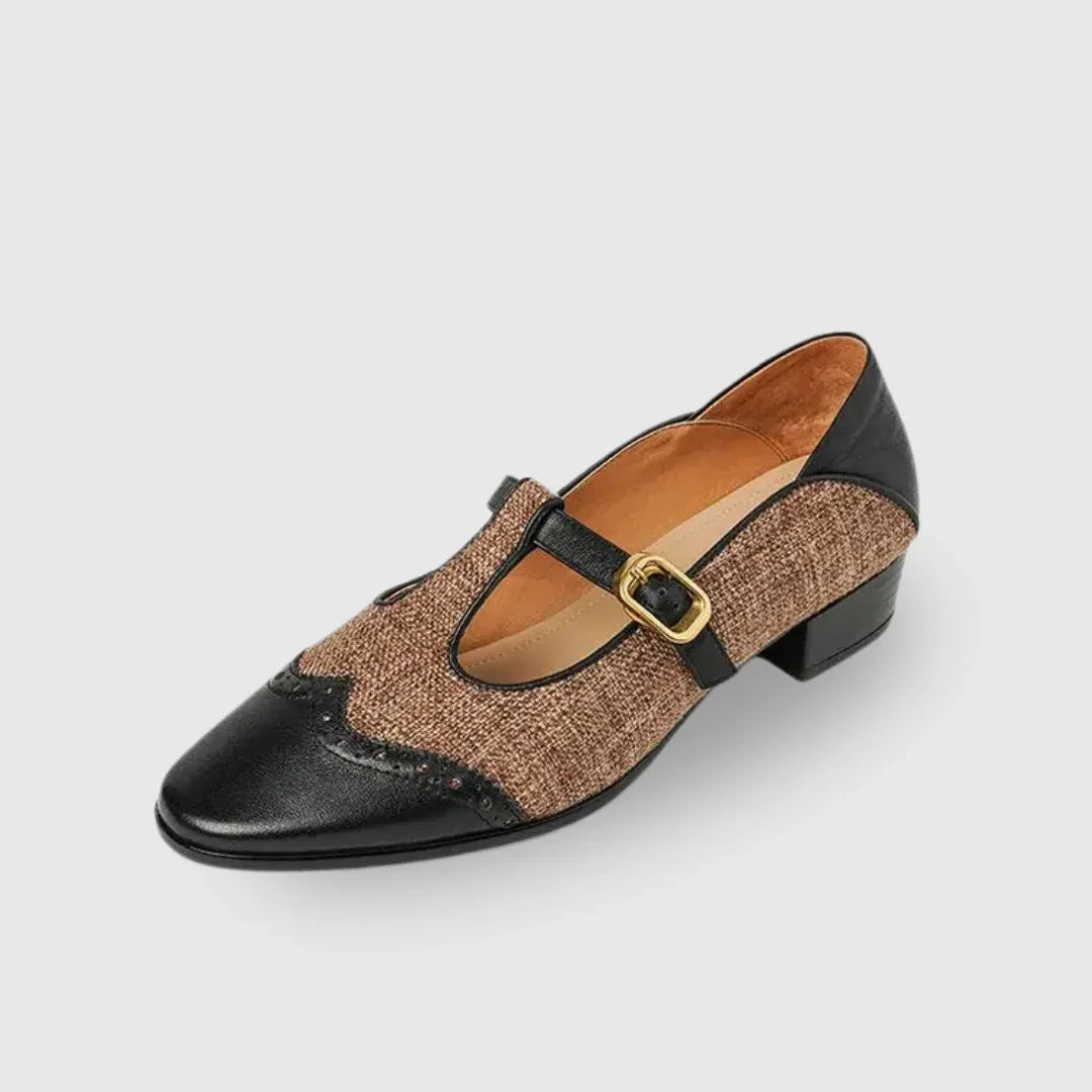Two-tone leather dress shoes with instep buckle strap and low block heel