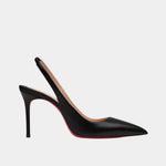 Shiny black pointed-toe slingback heels with high stiletto heel and open back