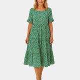 Green polka dot lightweight dress with short sleeves and gathered waist