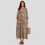 Floral summer dress in dark olive with multicolor scattered flowers and V-neck