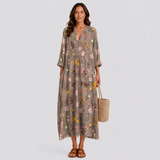 Floral summer dress in dark olive with multicolor scattered flowers and V-neck