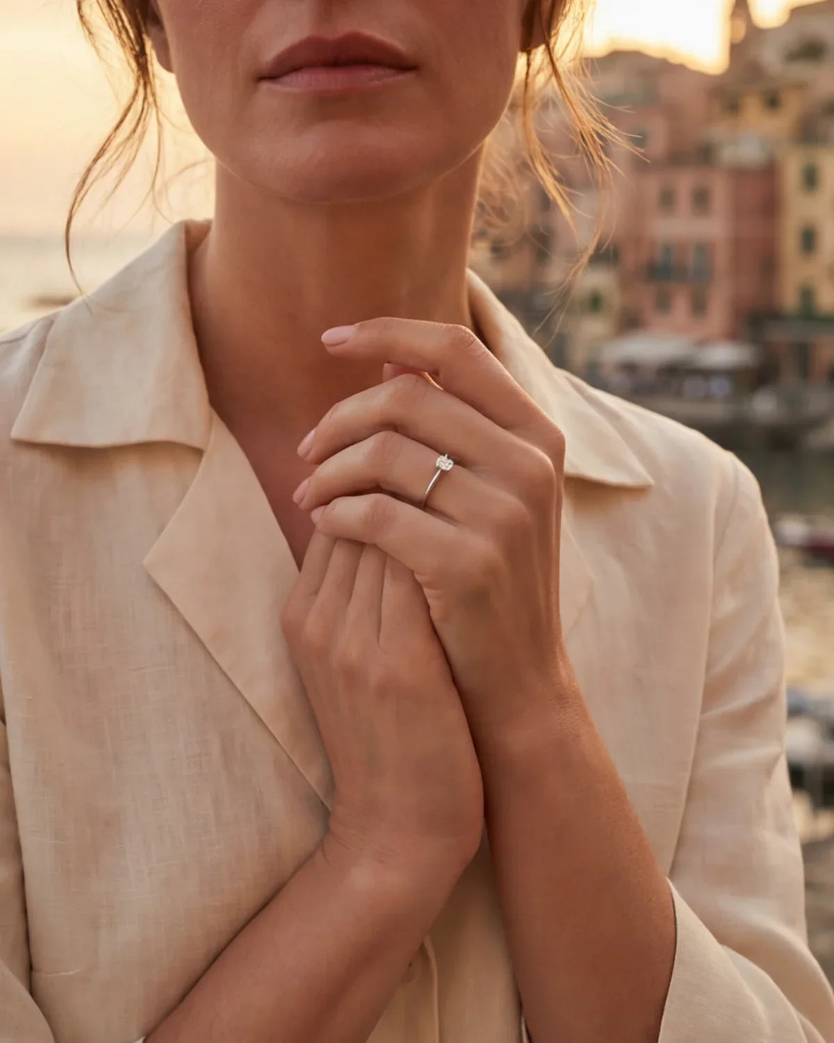 Solitaire ring with round gemstone on finger