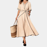 Beige V-neck spring dress with short sleeves, waist knot, and A-line midi skirt