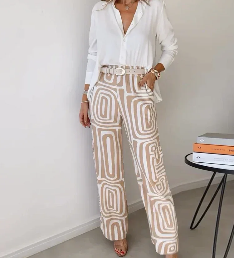 Two-piece outfit: white blouse with belt and cream pants with gray abstract swirl print