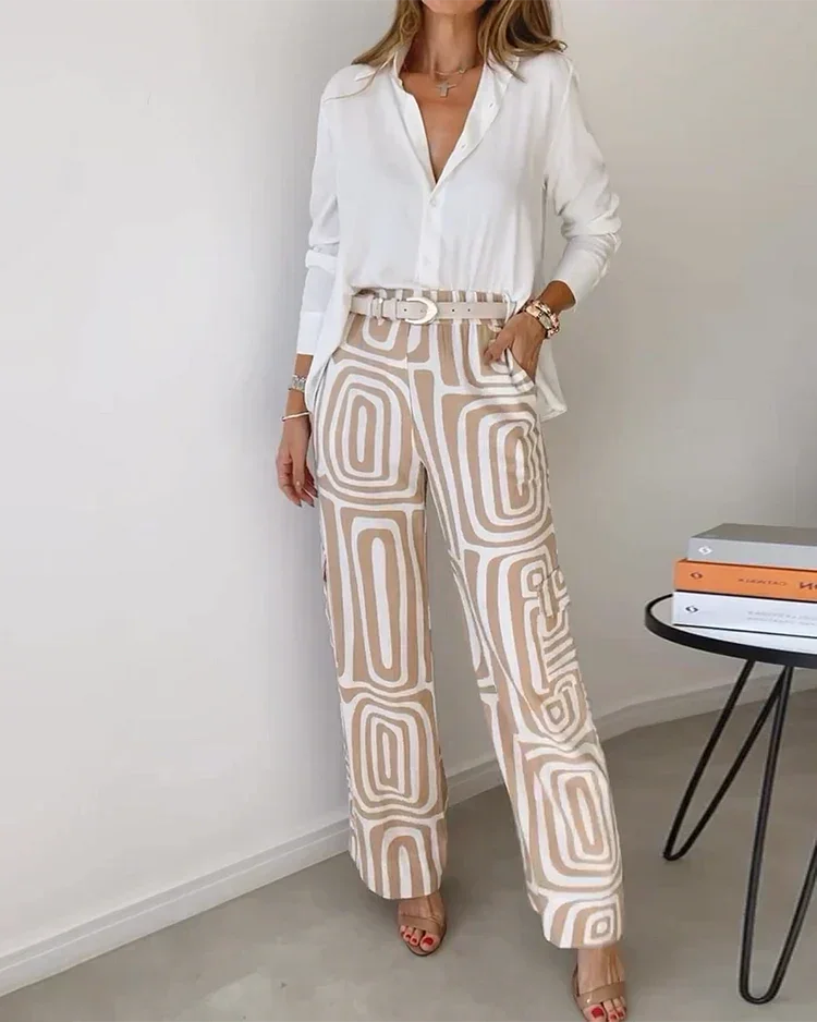 Two-piece outfit: white blouse with belt and cream pants with gray abstract swirl print