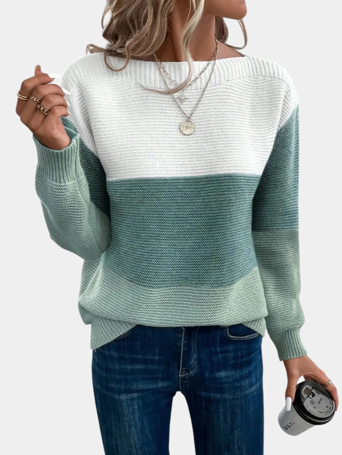 Two-tone knit pullover with crew neck, white upper to muted green gradient