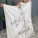 White combination top and wide-leg pants with illustrated back graphic and sequin details
