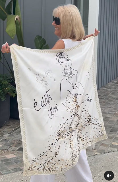 White combination top and wide-leg pants with illustrated back graphic and sequin details