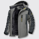 Gray winter jacket with black inner fleece panels, hooded collar, and zip closure
