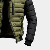 Men's puffer jacket close-up: green front with black sleeve, zip front and side pocket