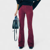 Burgundy corduroy flared pants with high rise and wide leg flare