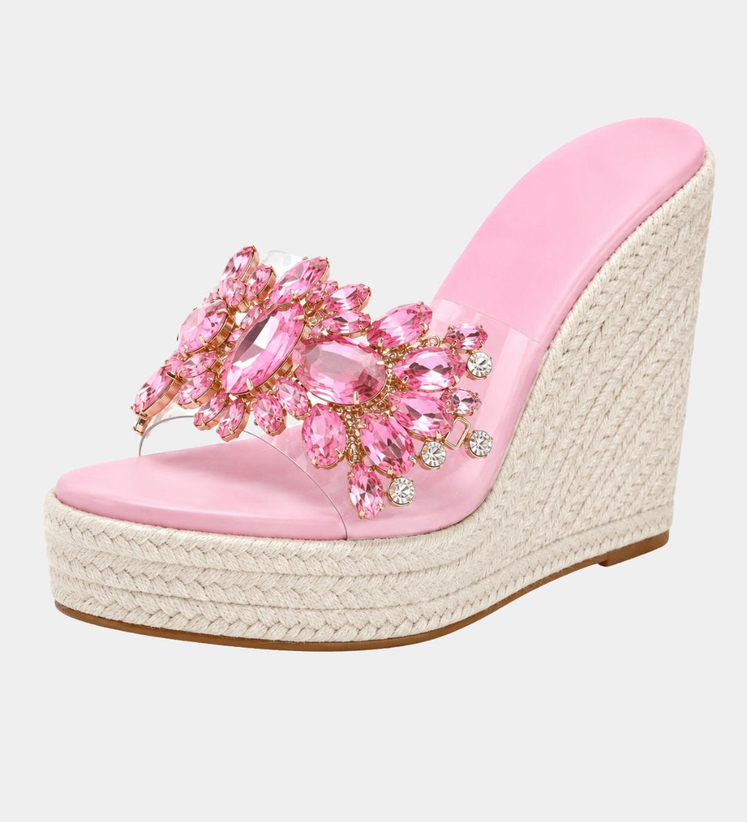 Pink heeled platform sandals with jeweled floral strap and woven jute wedge