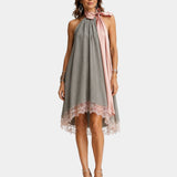 Gray sleeveless halter dress with lace hem and pink draped tie at neckline