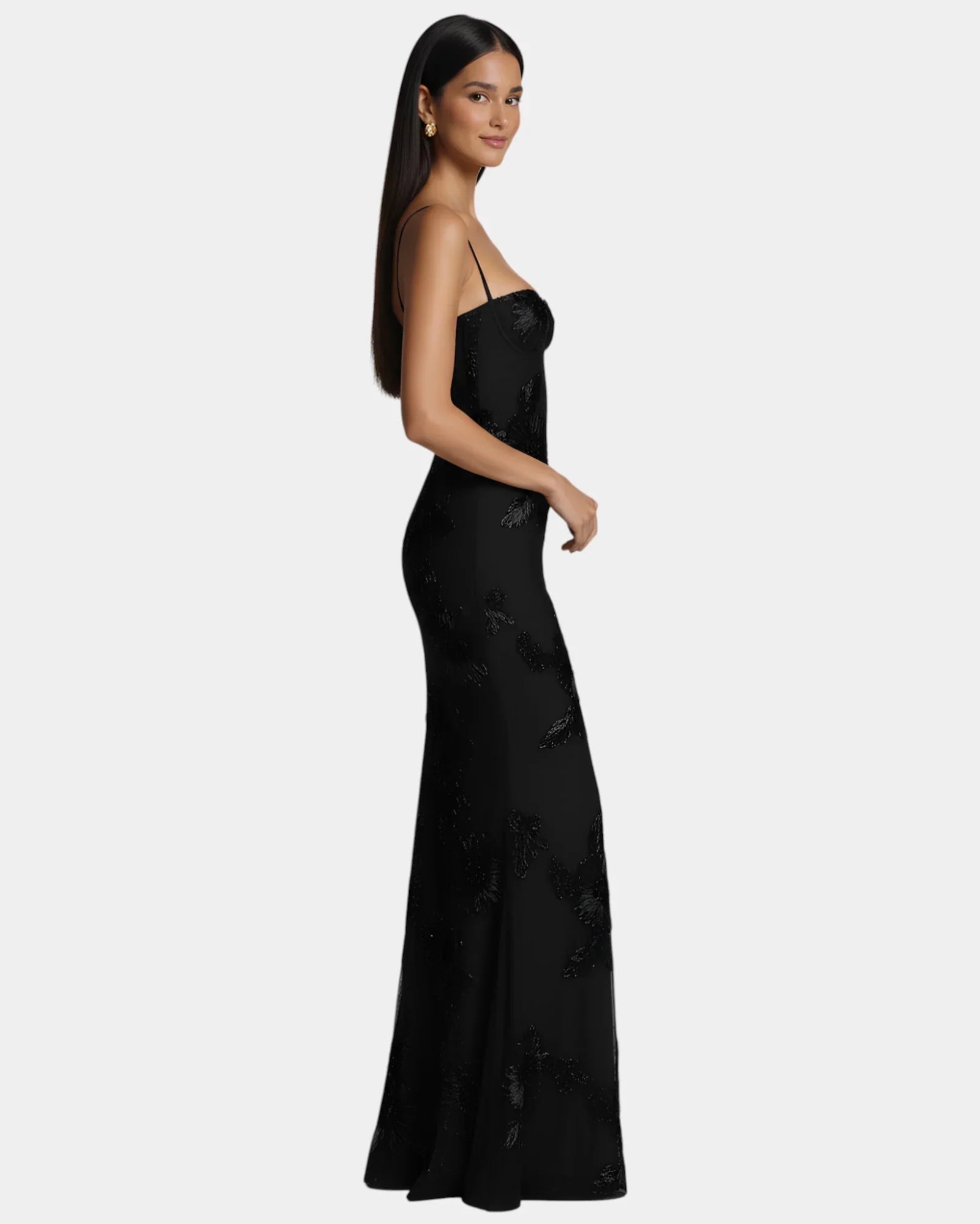 Black floor-length spaghetti-strap gown with subtle floral pattern