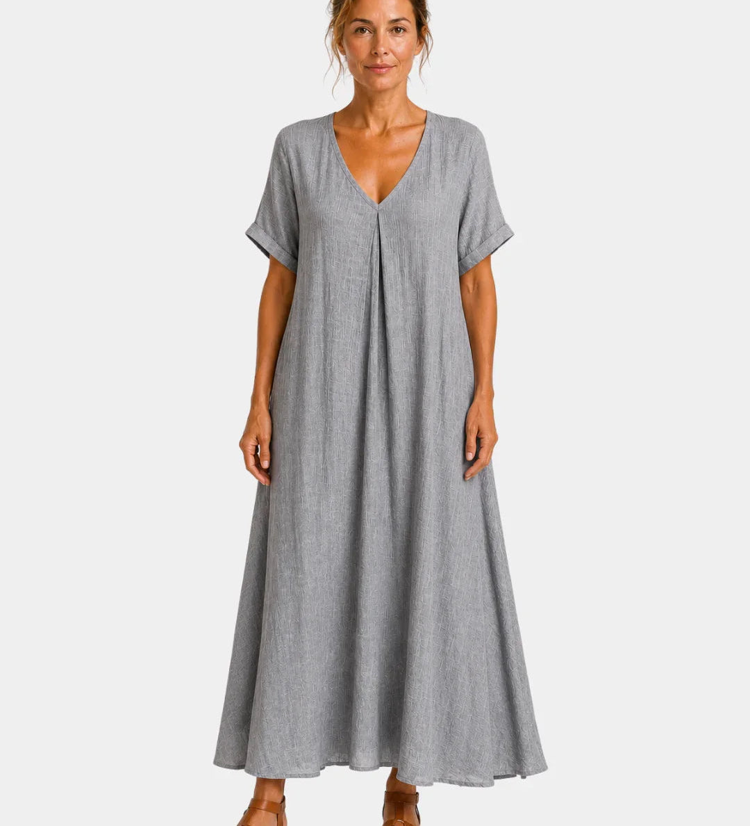Grey lightweight long dress with V-neck, short sleeves and gathered, flared skirt.