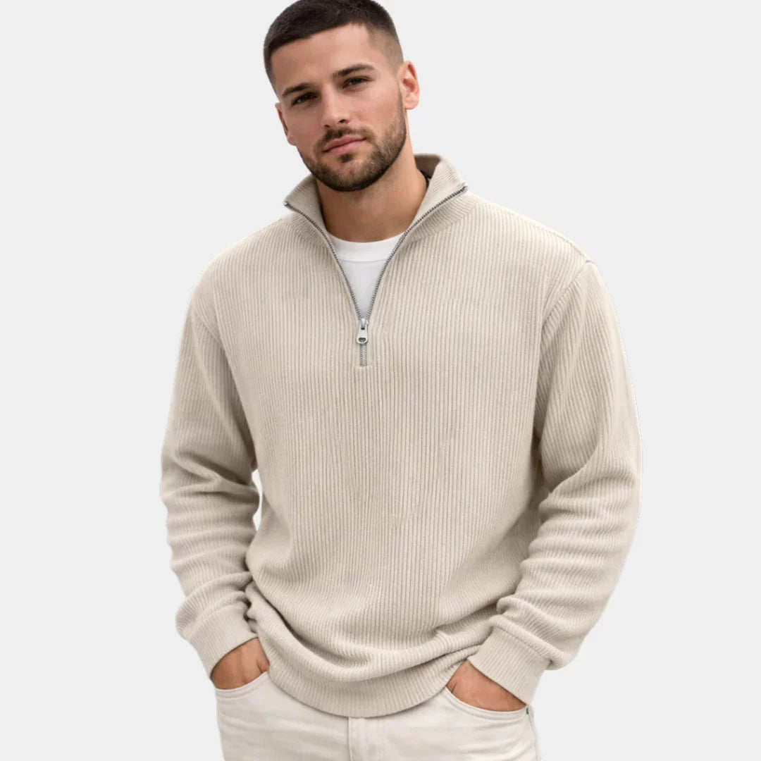 Beige ribbed quarter-zip sweater with long sleeves and short half-zip placket