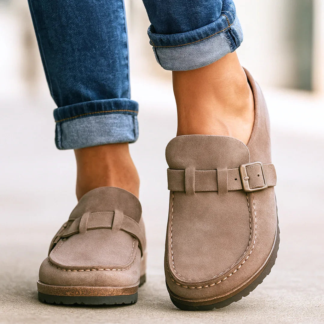 Taupe orthopedic slip-on loafers with buckle strap and stitched moc toe