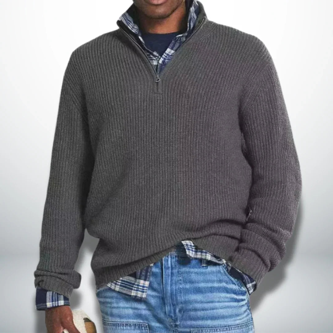 Gray knit quarter-zip sweater with ribbed cuffs and hem.