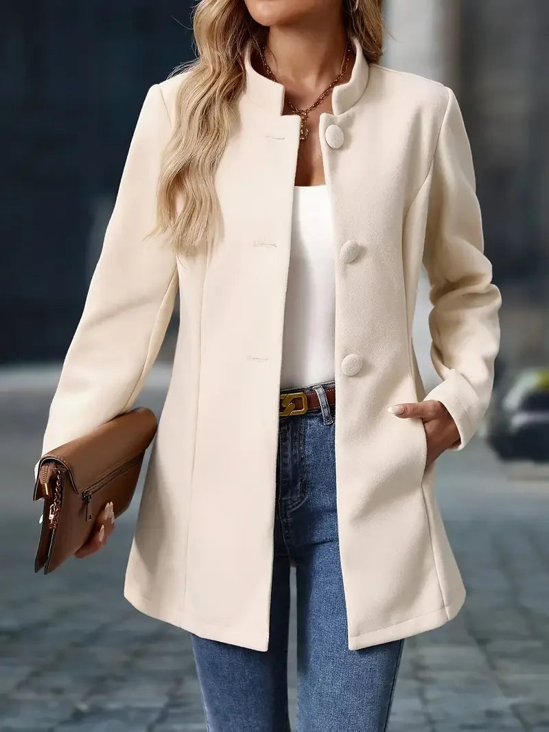 Cream button-front blazer jacket with notched lapel and long sleeves