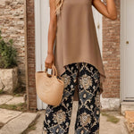 Sleeveless taupe tunic with curved hem paired with black gold paisley wide-leg pants