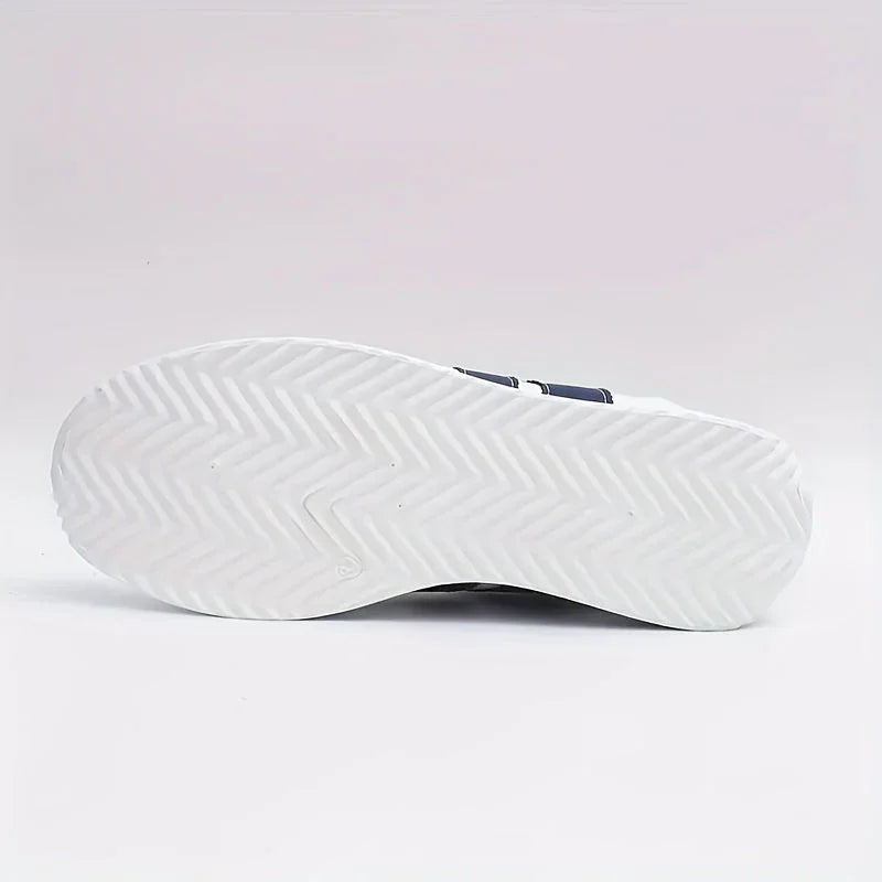 White sneaker outsole with deep tread for traction