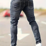 Dark gray ripped slim-fit jeans with five-pocket denim and distressed knee rips