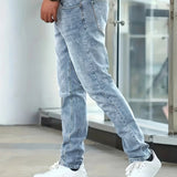 Light blue casual stretch jeans, straight fit, zip fly and belt loops.