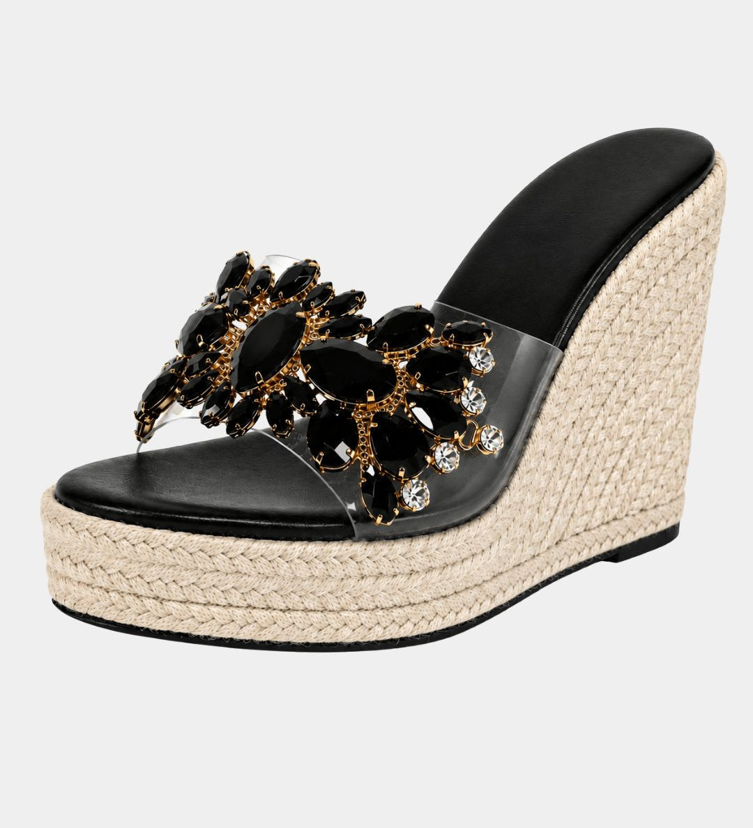 Black heeled platform sandals with dark jeweled floral strap and woven wedge
